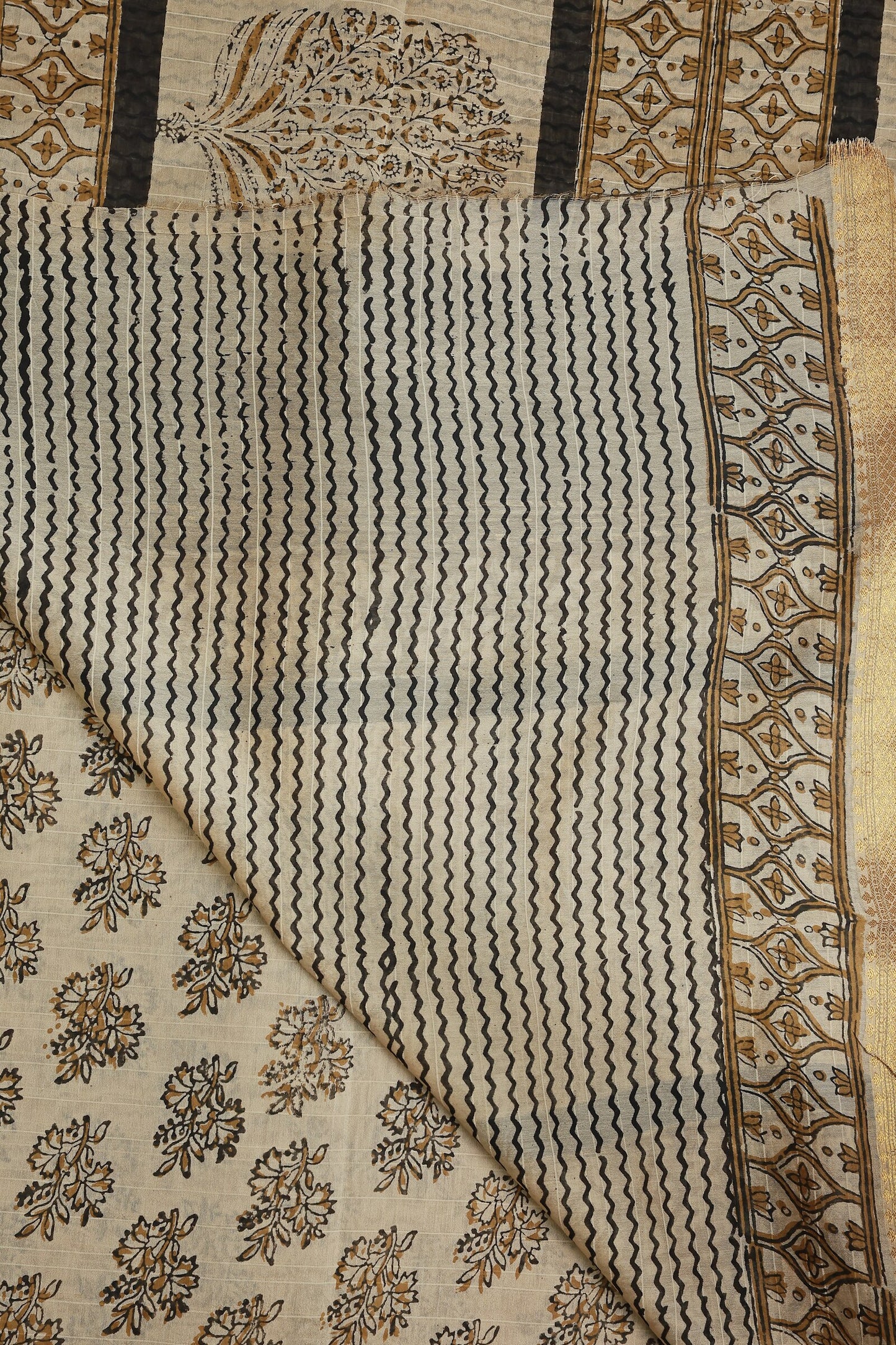 Beige Chanderi Handblock Print Saree With Natural Dye With Zari Border, folded saree view