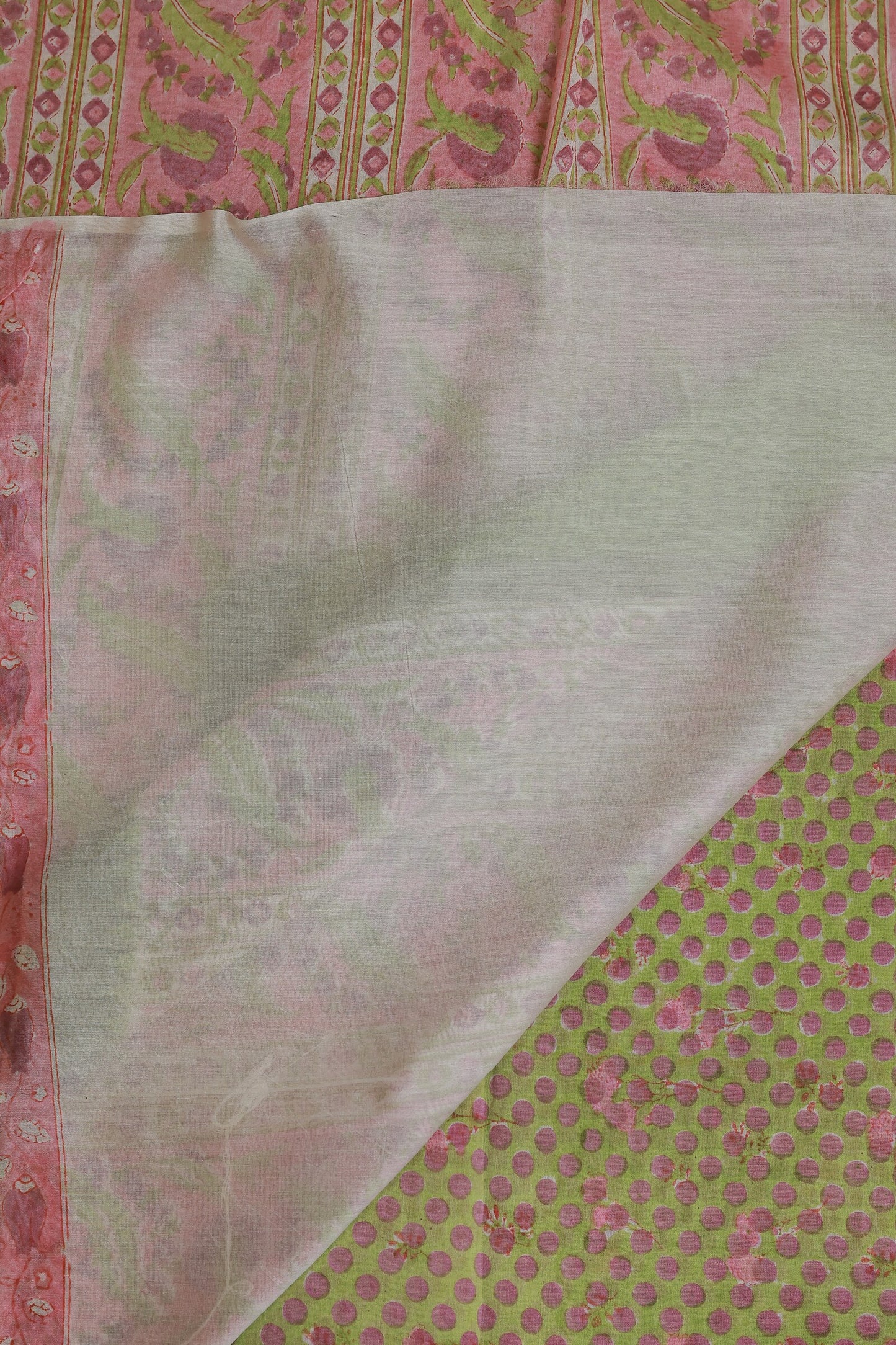 Pastel Green Chanderi Silk Saree With Lavender Polka Dots, folded saree view