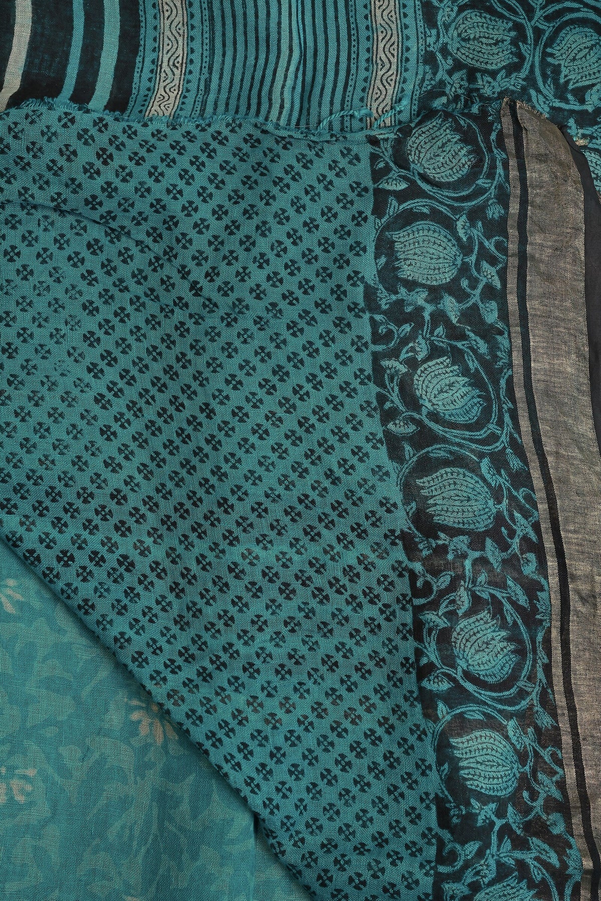 Peacock Green Linen Handblock Print Saree With Black And Zari Border, folded saree view