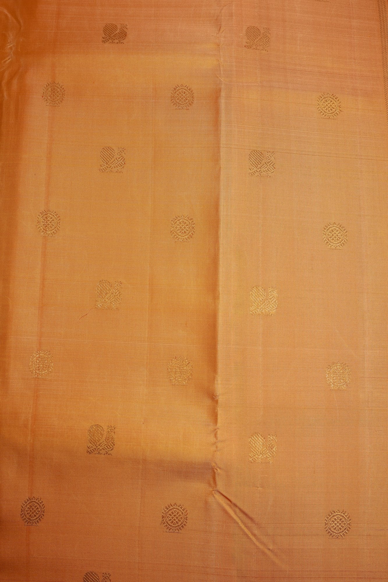 Sandalwood Kanjeevaram Saree with Light Orange Zari Border Mayil Chakram Buttas on Body