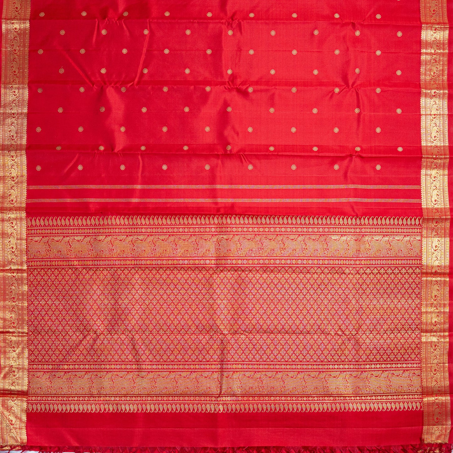 A red handwoven Kanchipuram silk saree in pure silk with 3-gram gold zari,
