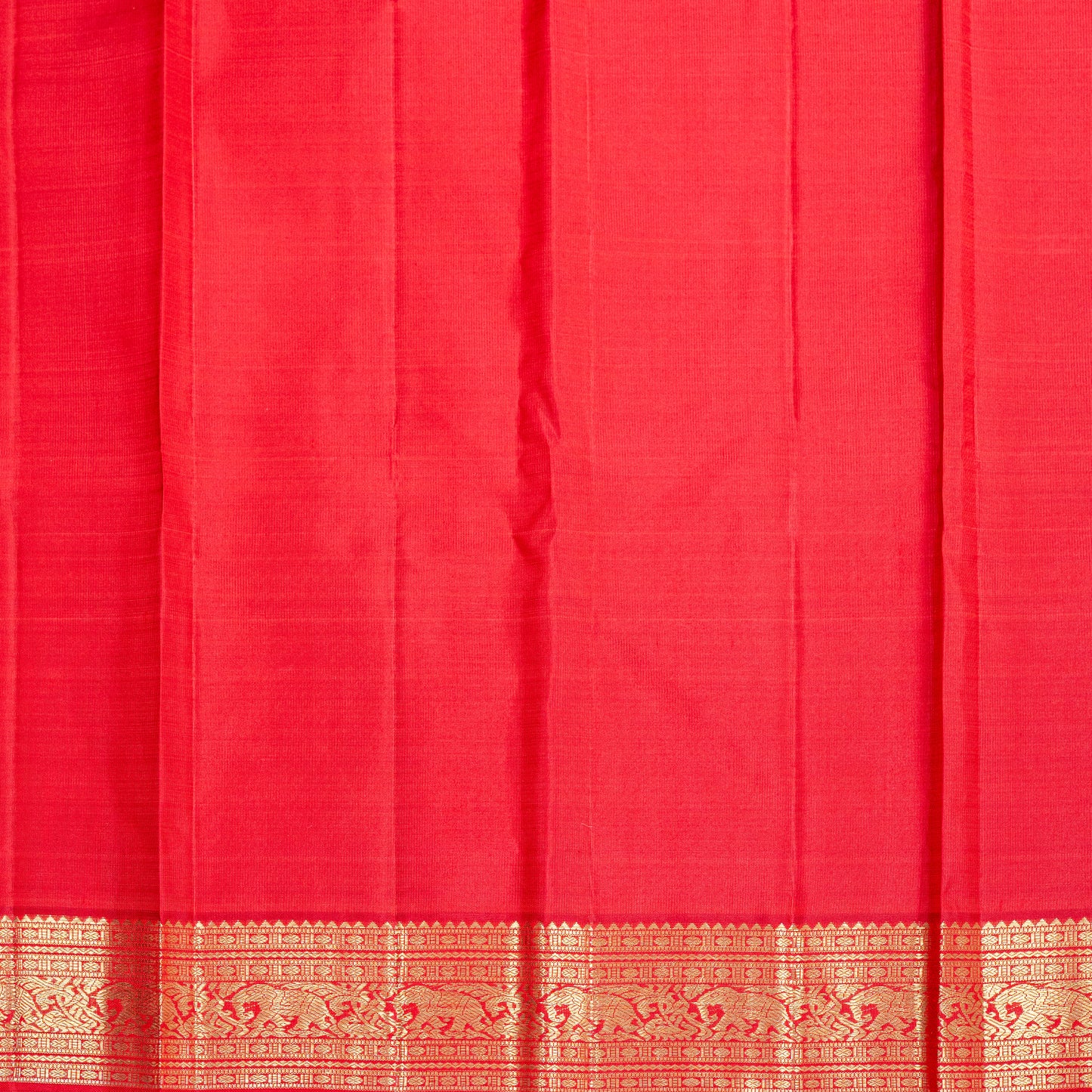 A red handwoven Kanchipuram silk saree in pure silk with 3-gram gold zari,