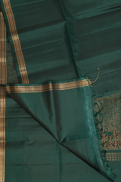 Bottle Green Pure Silk Saree With Small Zari Border, folded saree view