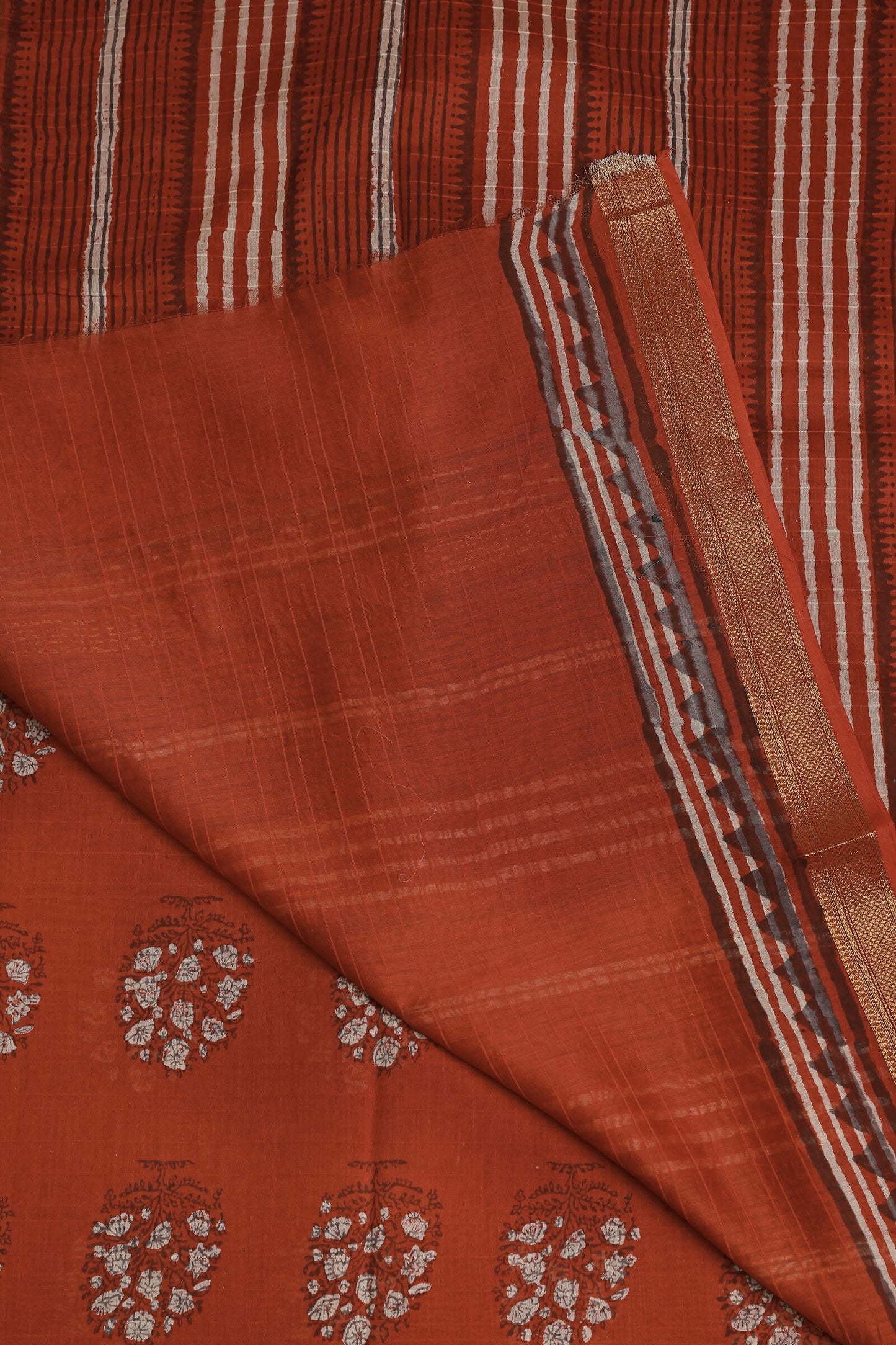 Brick Red Chanderi Silk Saree With Handblock Print, folded saree view