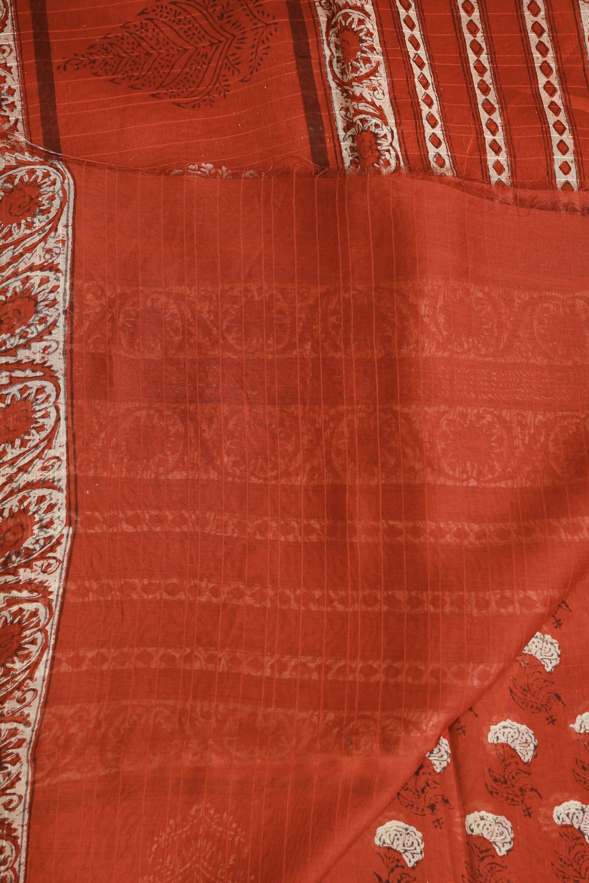 Brick Red Chanderi Silk Saree With Zari Border Handblock Print, folded saree view