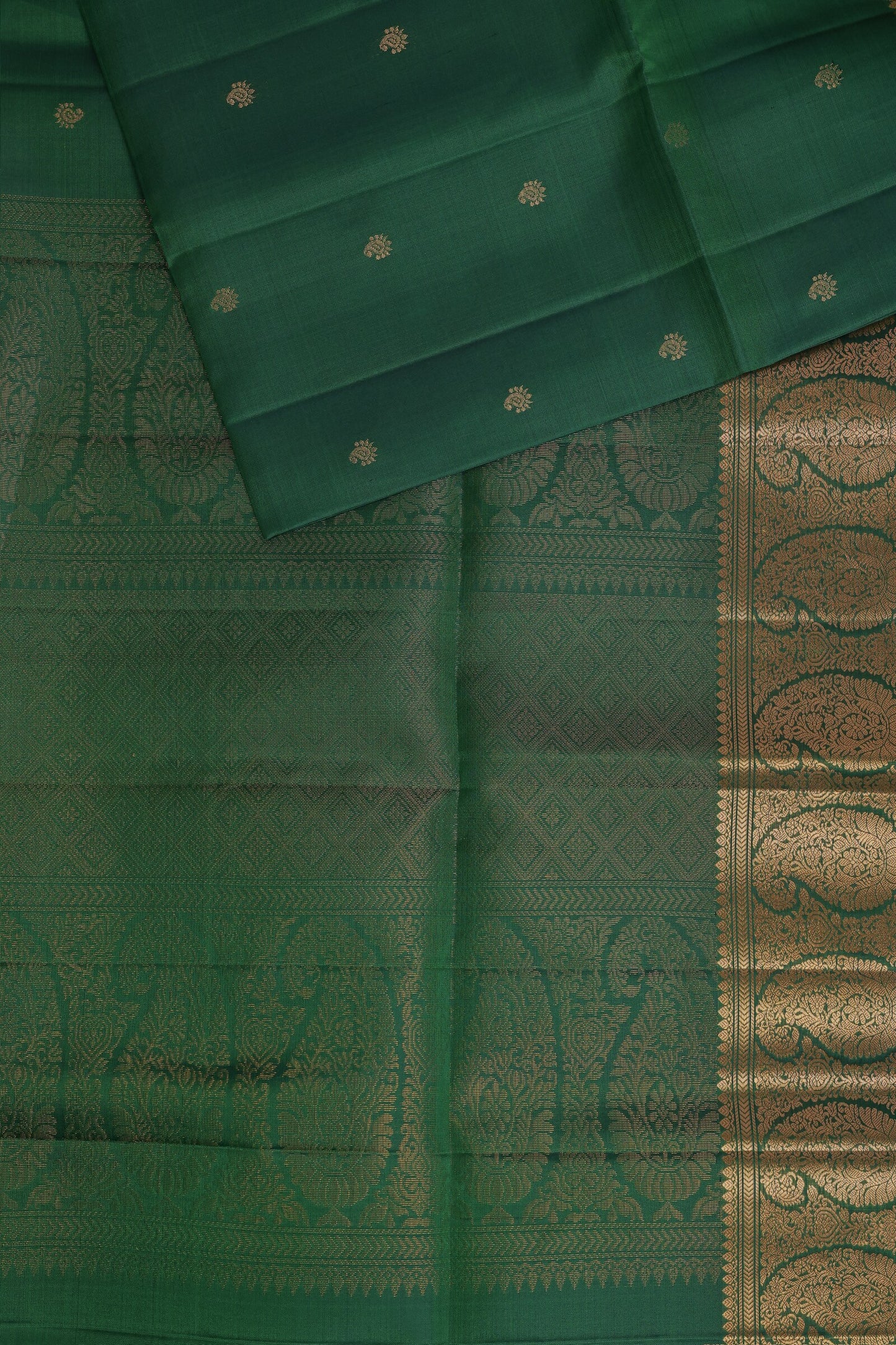 Dark Bottle Green Pure Silk Saree With Zari Mango Buttas On Border, folded saree view