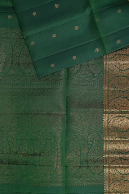 Dark Bottle Green Pure Silk Saree With Zari Mango Buttas On Border, folded saree view