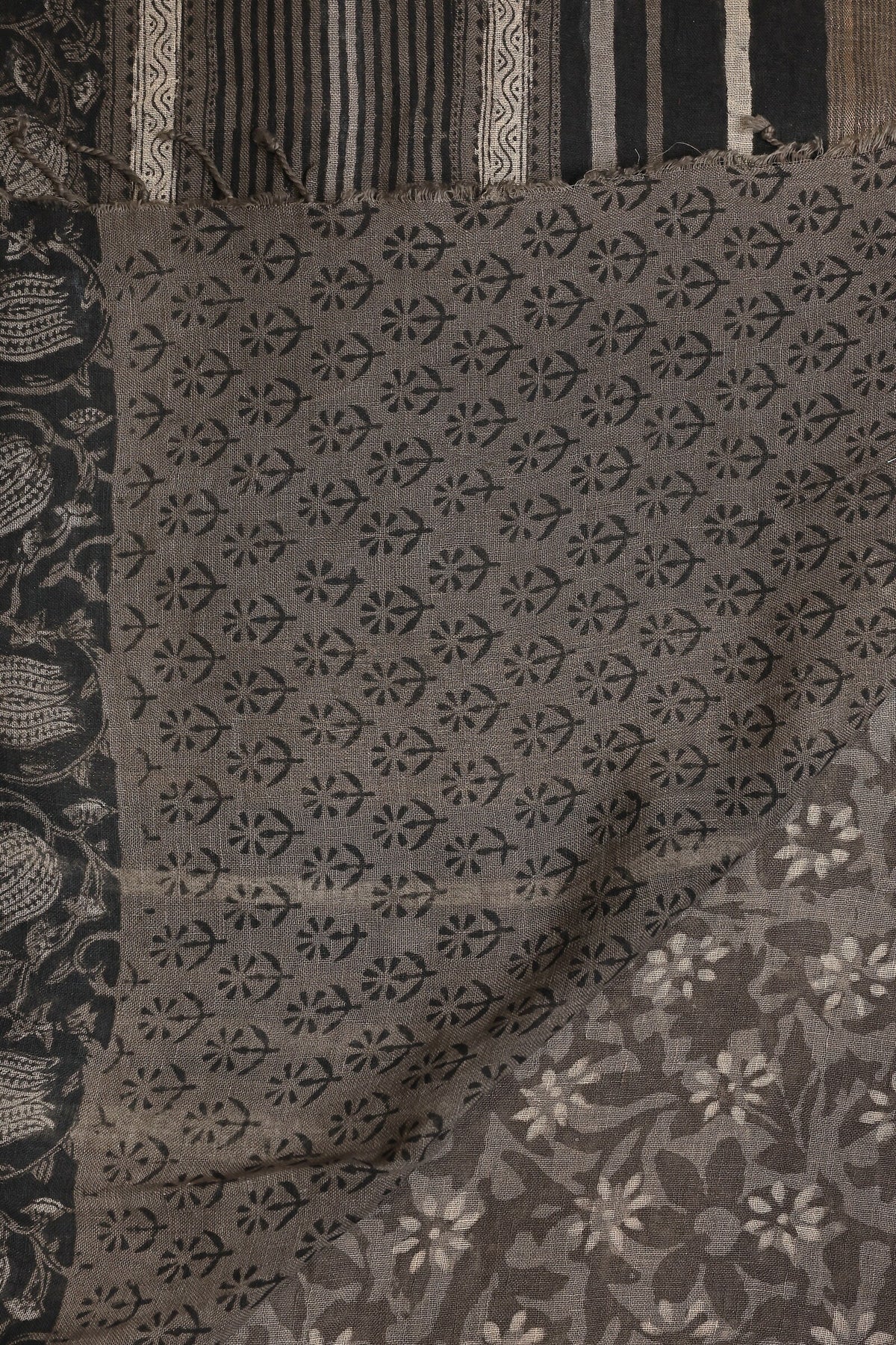 Dark Grey Linen Handblock Print Saree With Black And Zari Border, folded saree view