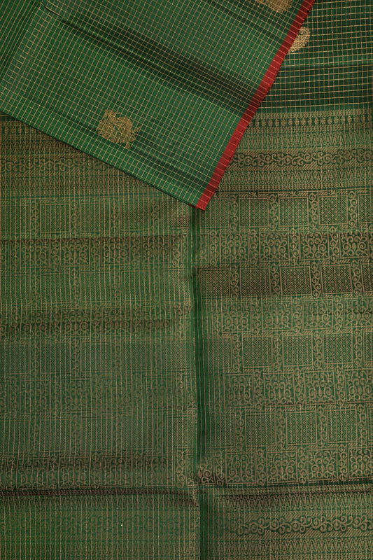 Green Pure Silk Saree With Small Zari Kattam And Mayil Buttas, folded saree view