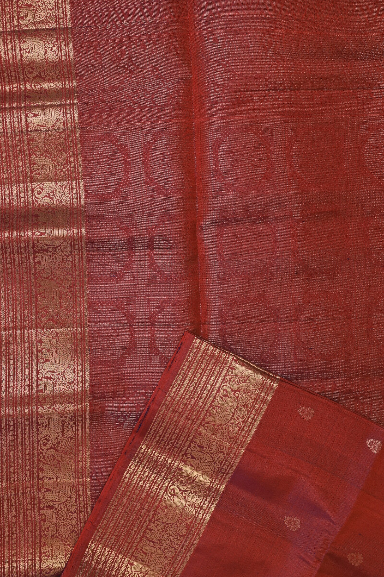 Magenta Red Pure Silk Saree With Elephant Zari Border, folded saree view