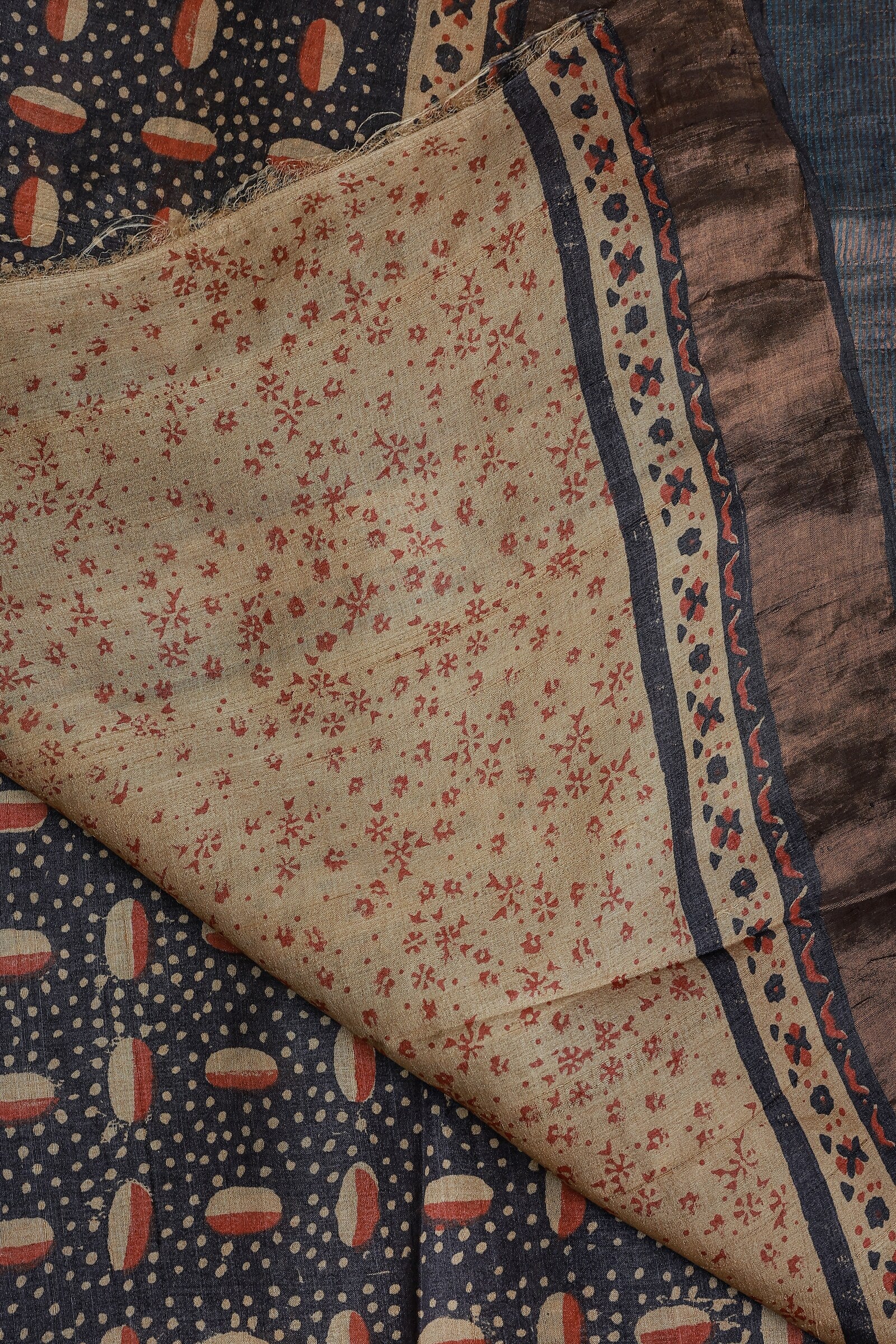 Navy Blue Tussar Silk Handblock Print Saree With Golden Zari Border Natural Dye, folded saree view