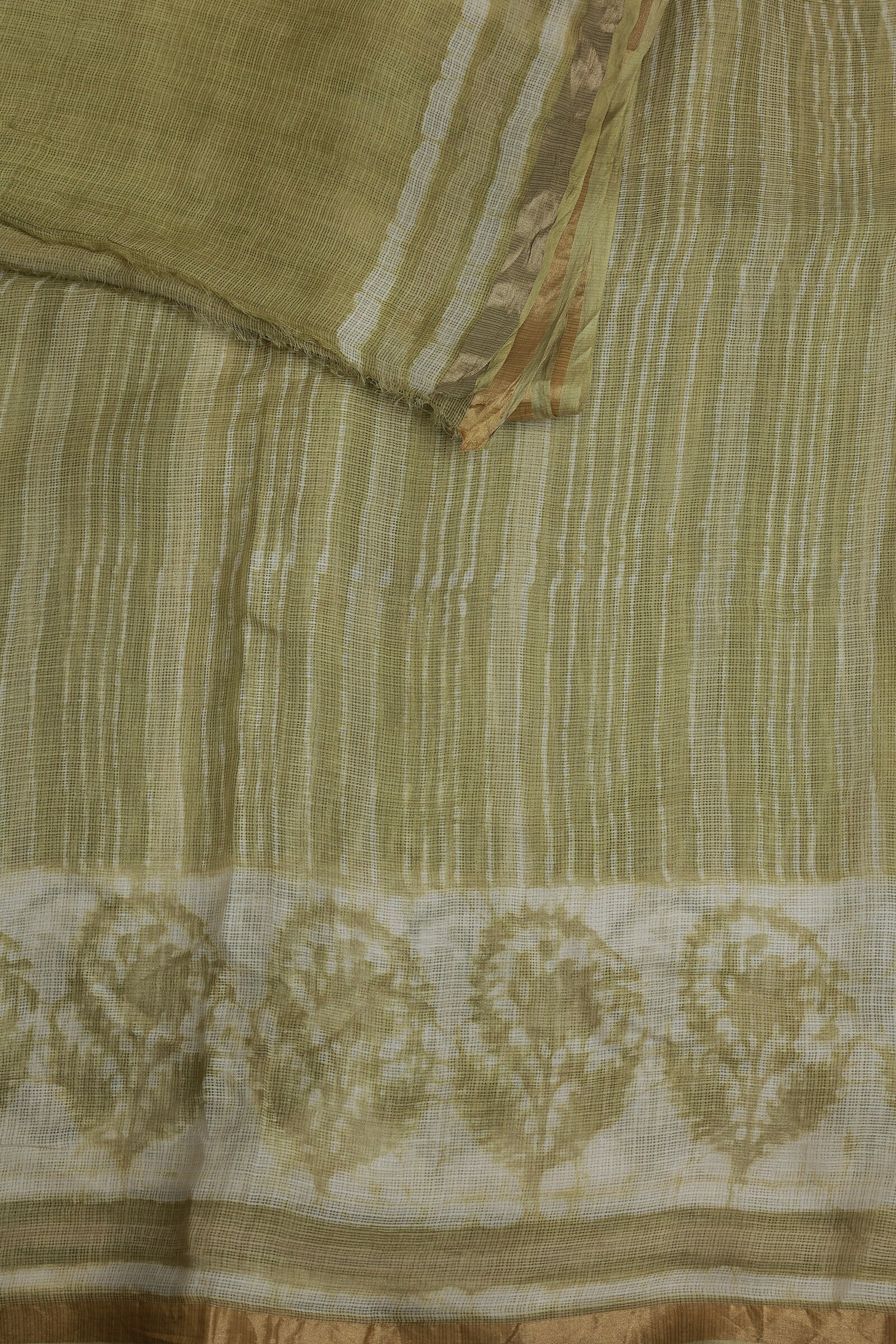 Off White And Olive Green Silk Kota Saree With Golden Zari Border, folded saree view