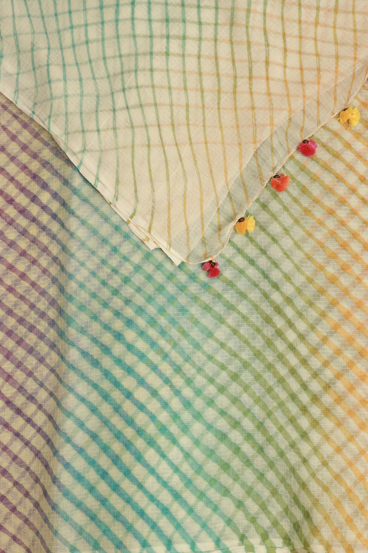 Off White, Green, Yellow And Pink Kota Lahariya Saree, folded saree view