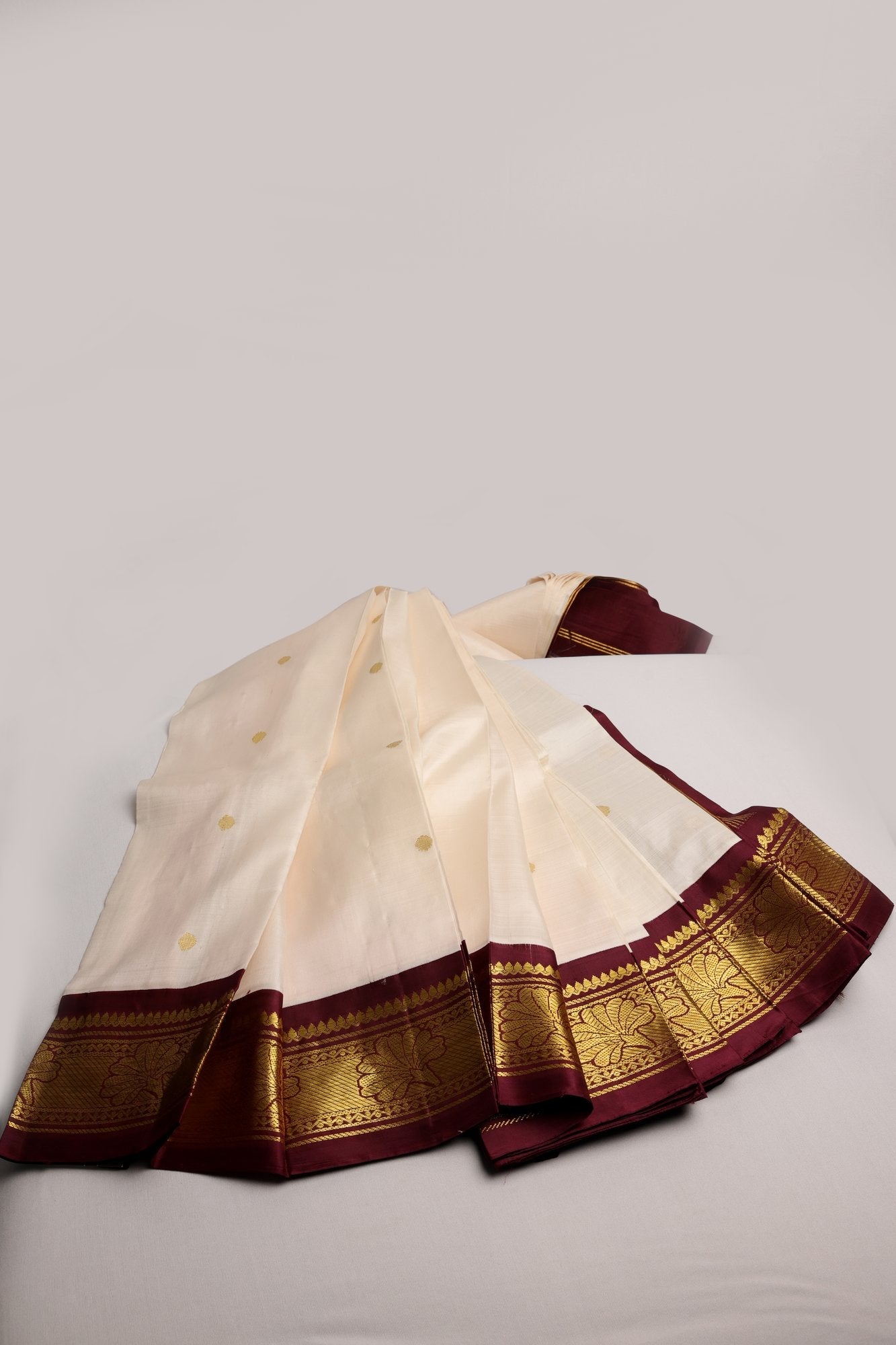 Offwhite and Coffee Brown Thirubhoovanam Saree