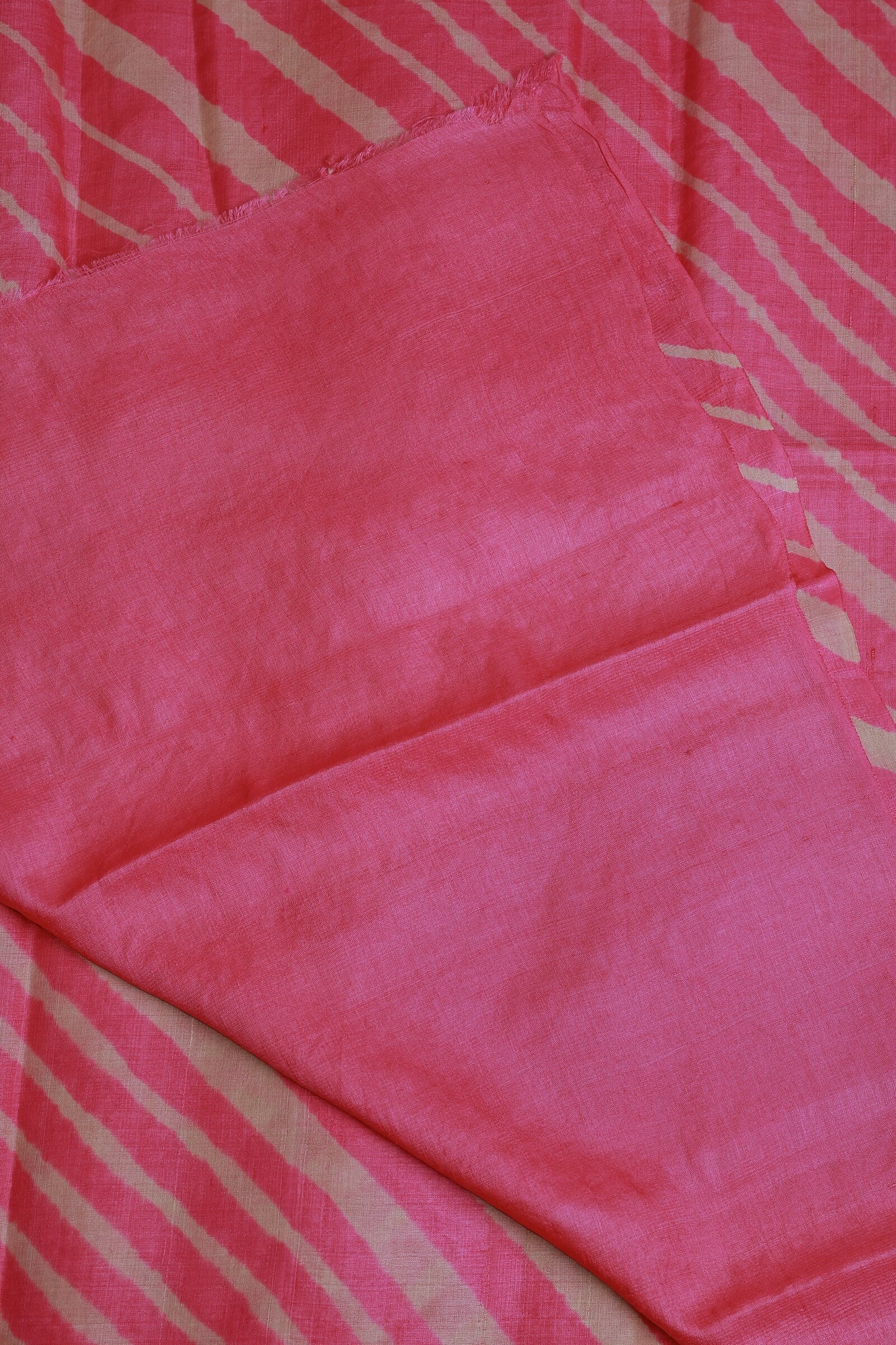 Peach And Off White Tussar Lahariya Saree, folded saree view
