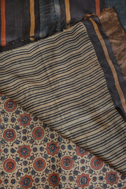 Pure Tussar Silk Saree With Handblock And Natural Dye With Zari Borders, folded saree view