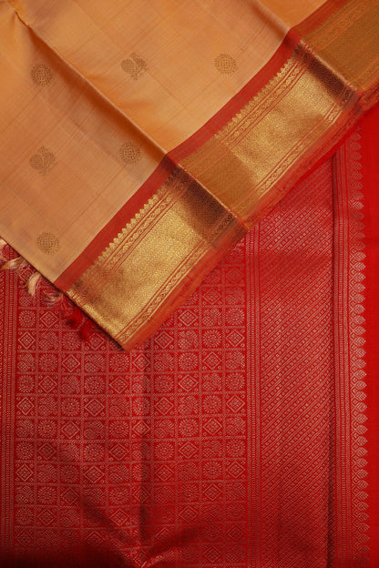 Sandalwood Kanjeevaram Saree with Light Orange Zari Border Mayil Chakram Buttas on Body