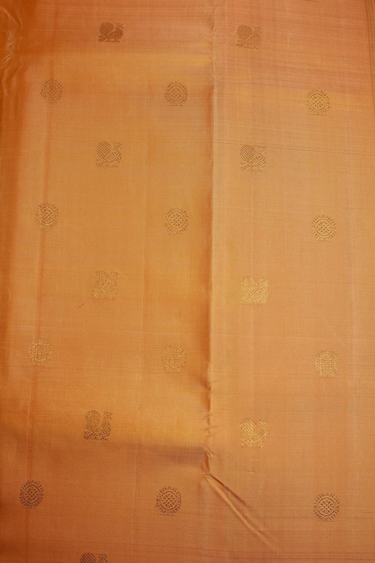 Sandalwood Kanjeevaram Saree with Light Orange Zari Border Mayil Chakram Buttas on Body