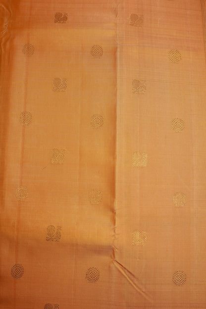 Sandalwood Kanjeevaram Saree with Light Orange Zari Border Mayil Chakram Buttas on Body
