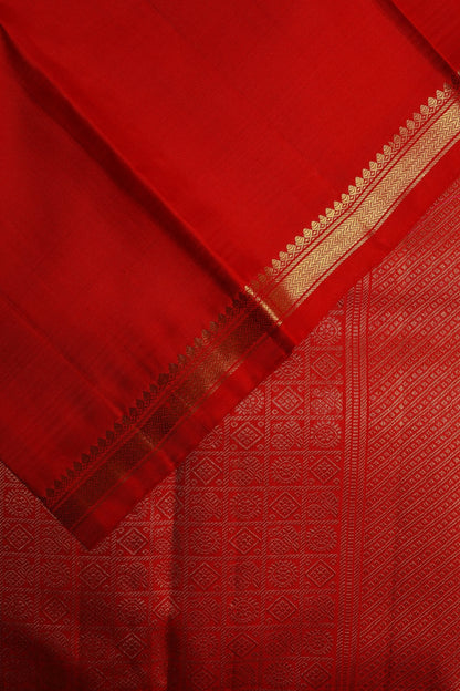 Sandalwood Kanjeevaram Saree with Light Orange Zari Border Mayil Chakram Buttas on Body
