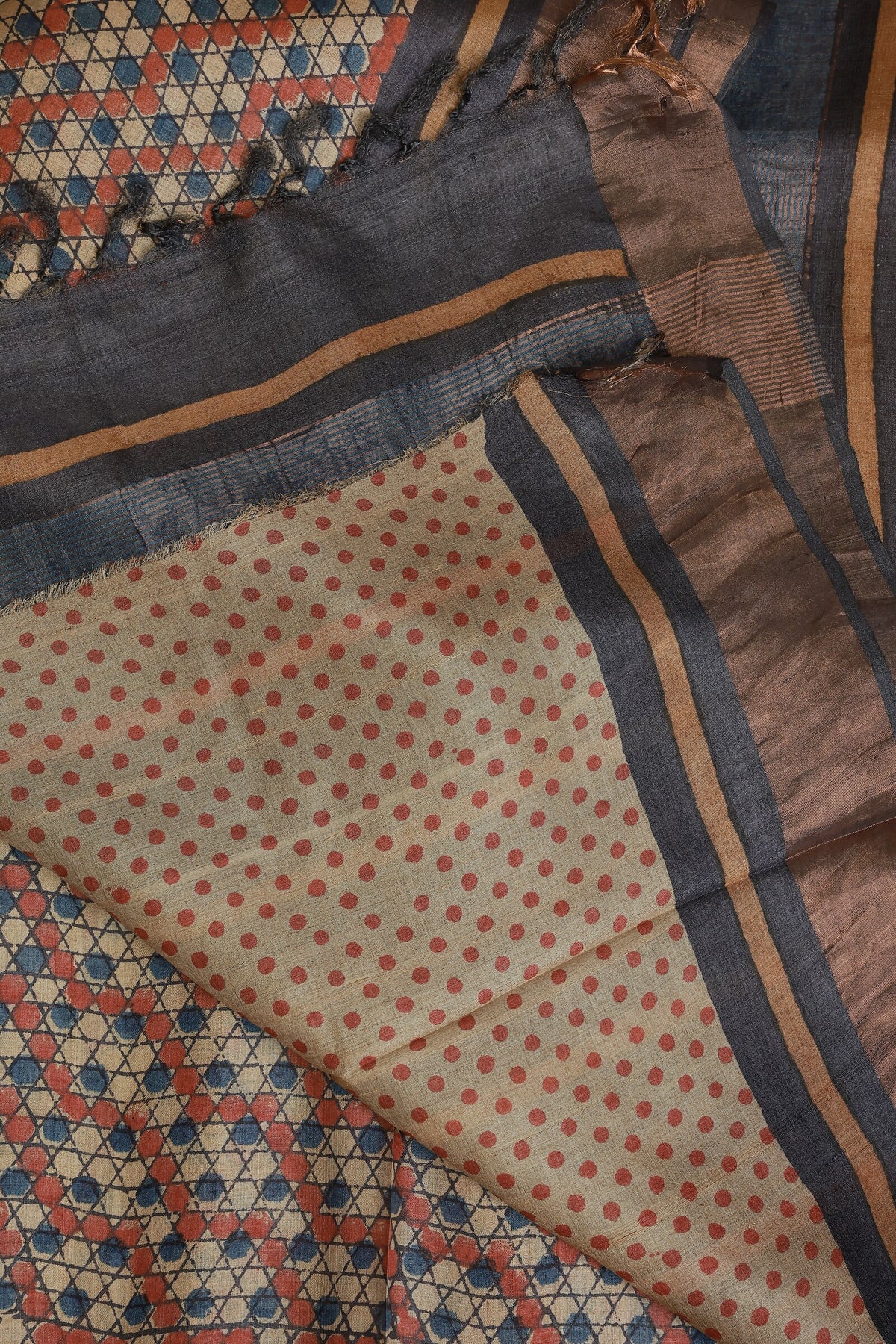 Tussar Silk Handblock Print Saree With Golden Zari Border, Red And Blue Triangle Polka Dots, And Natural Dye, folded saree view