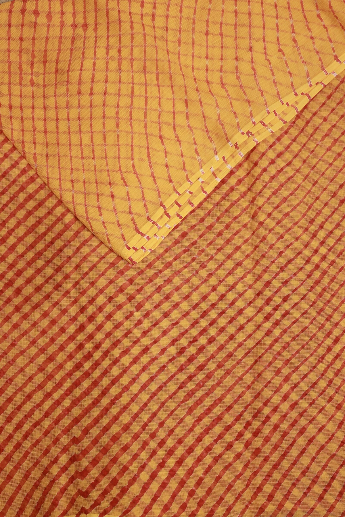Yellow And Red Kota Doria Lahariya Saree, folded saree view